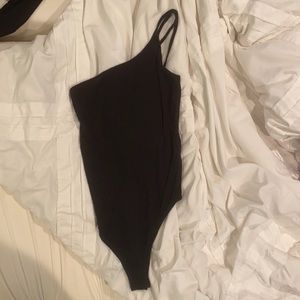 Black one shoulder body suit